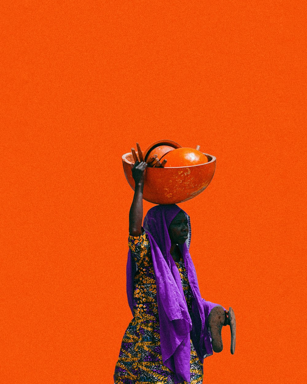 A trader carrying goods to market