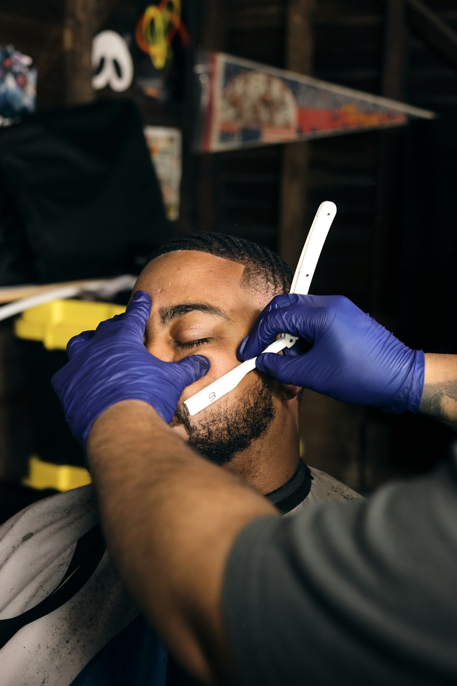 A barber giving a client a straight-razor shave